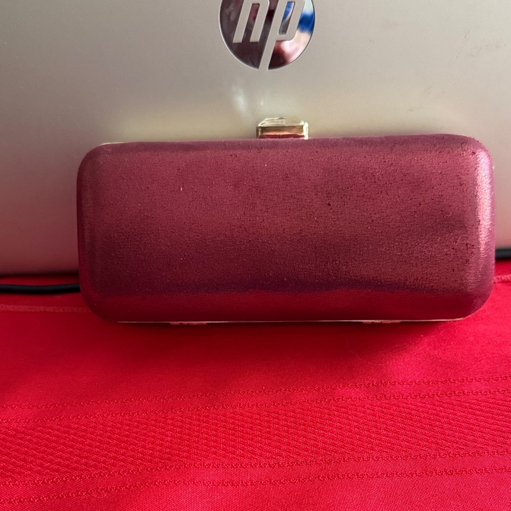 Elegant Burgundy Cache Clutch. Used once for a wedding.